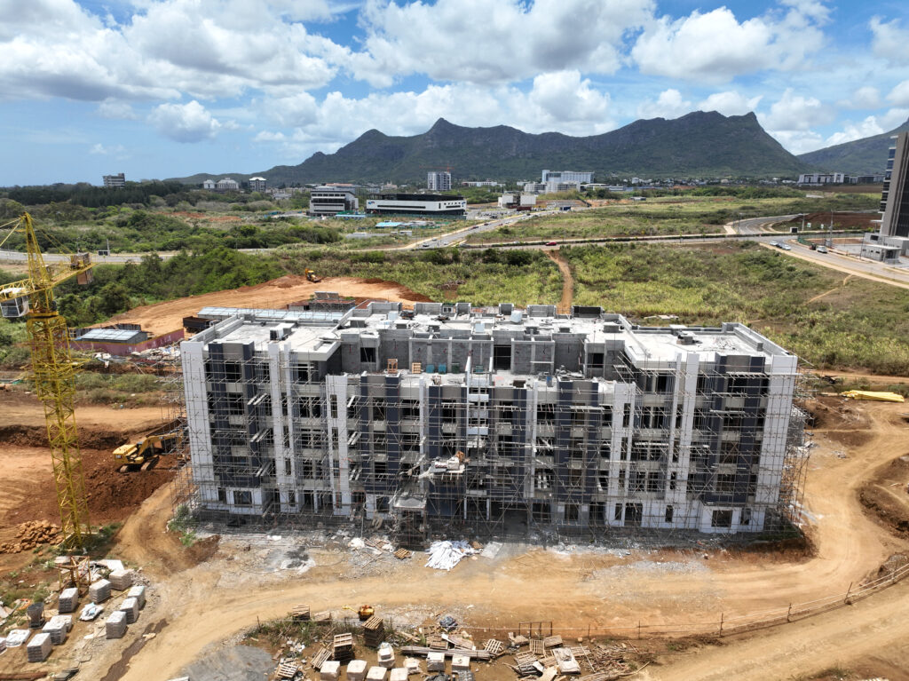 Professional and modern office spaces and premium residences at The Docks, offering flexible work environments and luxurious living in Port Louis and Ebene.